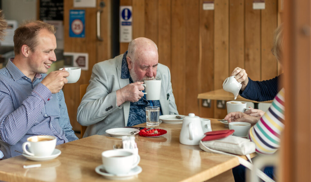 Darren having coffee with constituents